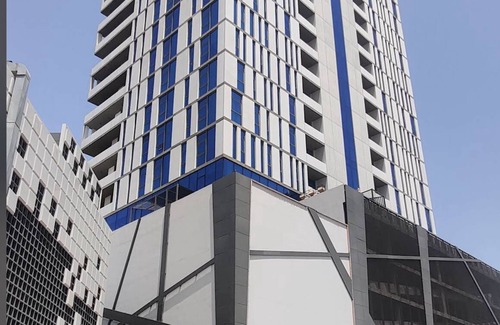 Seef Apartment | Charming 1BR on high floor in Seef with gym & pool.
