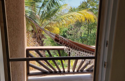 Crochu Apartment | Charming 2-bedroom hideaway near Cabier, full kitchen and air-conditioned rooms.