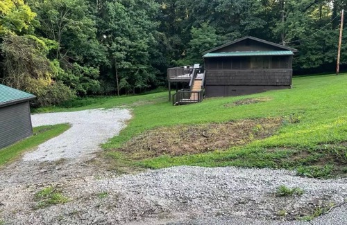 Raceland House | Charming 2-bedroom house located in beautiful wooded setting!