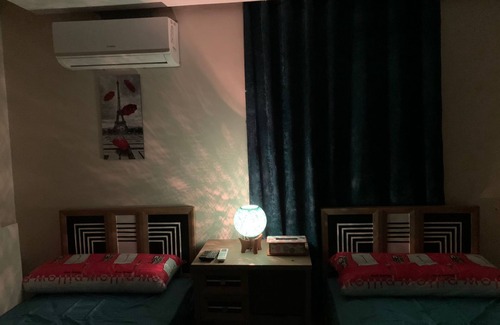 Sheikh Zayed City Apartment | Charming 2-bedroom studio in delightful 6th of October City with WiFi, AC