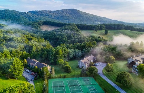 Blowing Rock Apartment | Charming 2BR Chetola Resort Condo with fireplace, Walk-in shower, and jetted tub