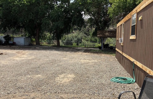Navajo Dam House | Charming 3-bedroom home on San Juan River, access to river within feet of door.