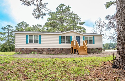 Belhaven House | Charming 3-bedroom house on the water with a dock, close to Belhaven & Bath NC.