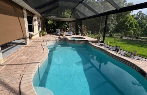 Joel House | Charming 3-bedroom house in marvelous Lehigh Acres with Heated Pool and Hottub