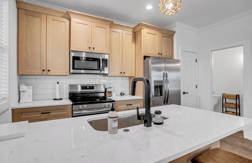 Dunean House | Charming 3-BR townhome < 1 Mile from Fluor Field: Garage, E-Bike Rental, 2KingB