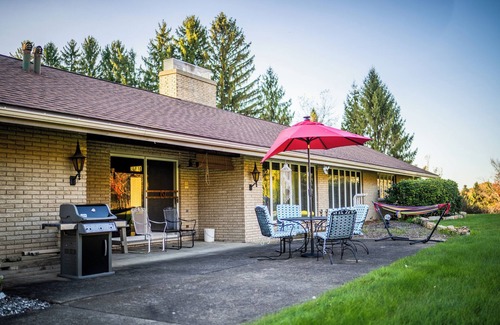 Kane House | Charming 4-BR retro-styled house on large lot in Kane