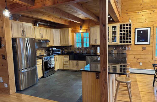 Carrabassett Valley Ski Chalet | Charming 4-bedroom mountainside chalet on Sugarloaf golf course