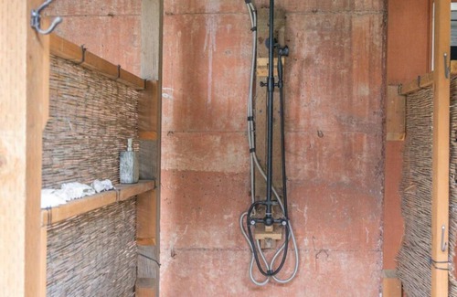 Three Tree Point House | Charming and eclectic treehouse-like home with expansive Puget Sound views