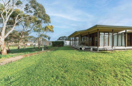Macgillivray Cottage | Charming and Private Cottage with Fireplace for a Cozy Island Getaway.