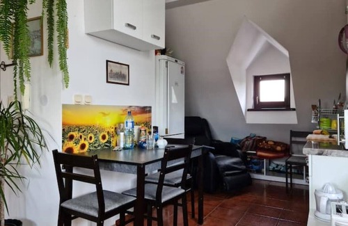 Nowa Huta Apartment | Charming apartment with terrace and garden view.
