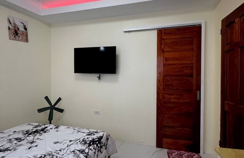Compostela Bed & Breakfast | Charming Bed & Breakfast Room #1 with WiFi and AC in Delightful Compostela Cebu