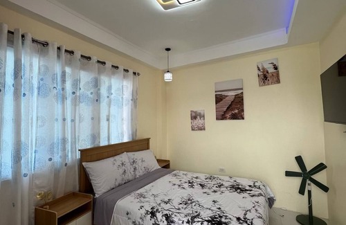 Compostela Bed & Breakfast | Charming Bed & Breakfast Room #1 with WiFi and AC in Delightful Compostela Cebu