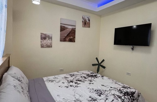 Compostela Bed & Breakfast | Charming Bed & Breakfast Room #1 with WiFi and AC in Delightful Compostela Cebu