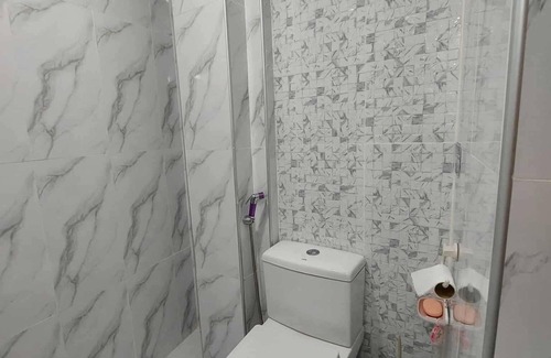 Compostela Bed & Breakfast | Charming Bed & Breakfast Room #1 with WiFi and AC in Delightful Compostela Cebu