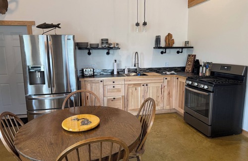 Benzonia House | Charming Brando in pleasant in the quiet and secluded woods.
