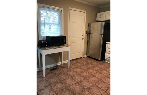 Buford Highway House | Charming bungalow in quiet neighborhood inside 285