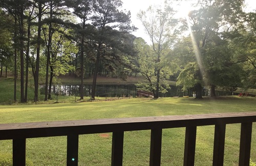 Crawfordville Cabin | Charming Cabin on 50 Wooded Acres with Pond & Pool. Great for families & friends