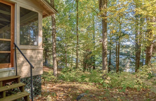 Norway Cabin | Charming Camp with an upstairs loft and wrap around deck. Near the Lake!