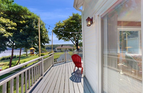 Bath House | Charming Cape-style House with Panoramic River Views and Modern Amenities