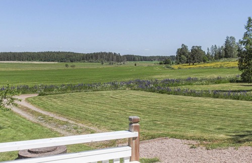 Kristinehamn House | Charming cottage with fireplace and lake view.