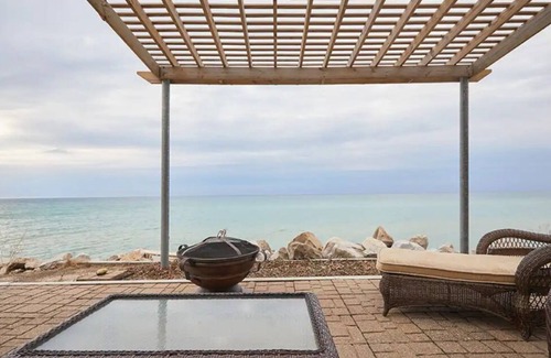 Mears Cottage | Charming Cottage with 180 degree views of Lk Michigan- short walk to sand dunes