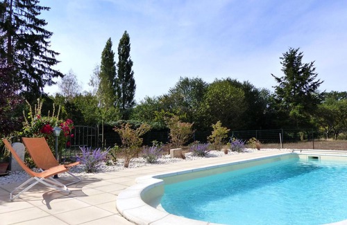 Target Cottage | Charming Cottage with Shared Pool, Garden, and Modern Amenities in Tranquil Village Setting