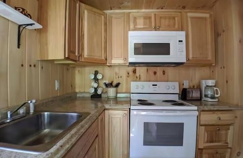 Raymond Cottage | Charming Getaway with Screened Porch, Deck, and Scenic Lake Views