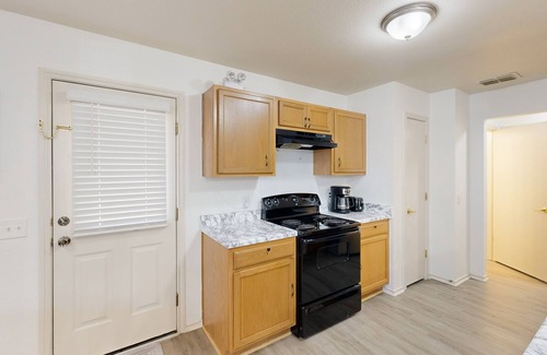 Dittmar Crossing House | Charming getaway with sunny patio & enclosed yard - near downtown - dog-friendly