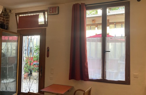 20th Arrondissement Apartment | Charming ground floor studio on quiet courtyard.
