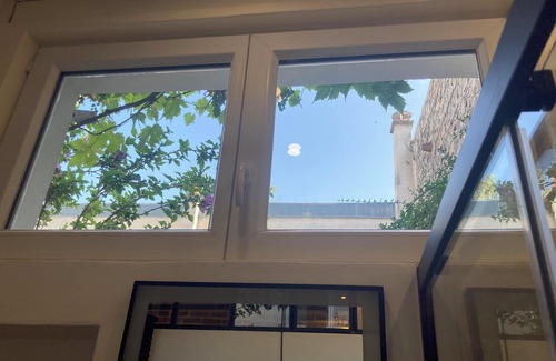 20th Arrondissement Apartment | Charming ground floor studio on quiet courtyard.