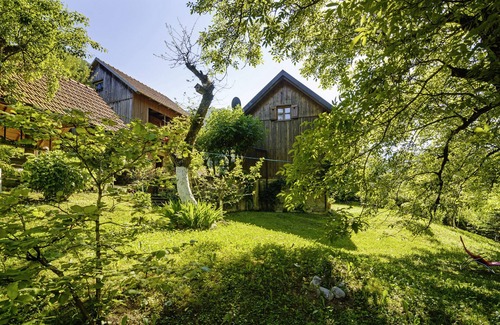 Delnice House | Charming holiday home with 2 bedrooms in an idyllic location, garden with barbecue pavilion, only 20 m from the beach on the river Kupa