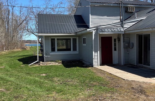 Sault Ste. Marie House | Charming house on the St. Mary's river in Sault Ste. Marie, freighters out front