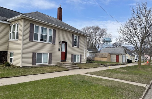 Escanaba House | Charming house walking distance to restaurants -1.7 miles to beach!