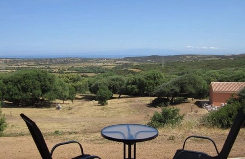 Aglientu Apartment | Charming juniper house with pool -solarium, sea view and lots of nature