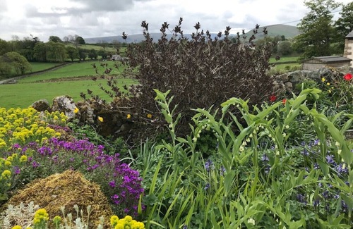 Penrith House | Charming Lake District cottage with beautiful views, parking & EV charger.