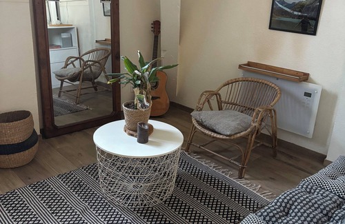 Evian-les-Bains Apartment | Charming little studio with lake and mountain views from the bed.