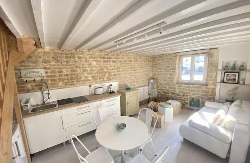 Luc-sur-Mer House | Charming little house with exposed stonework