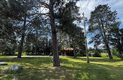 Crystal Falls Cabin | Charming log cabins on Paint River - Pet Friendly!