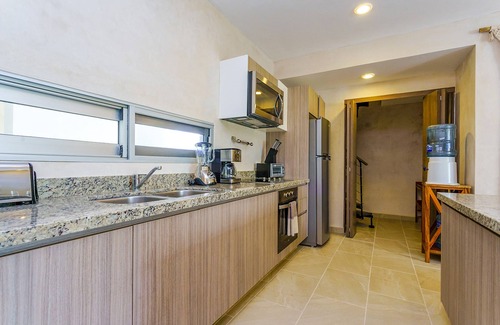Zama Apartment | Charming Nature-Inspired Condos with Sultry Surroundings by Stella Rentals