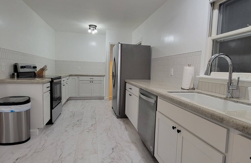 Sioux City House | Charming, newly renovated Tudor home next to Morningside University!