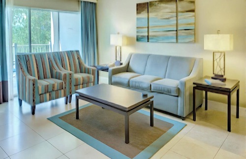 West Kissimmee Resort | Charming Orlando resort with pools, outdoor fun, dining & recreation pavilion.