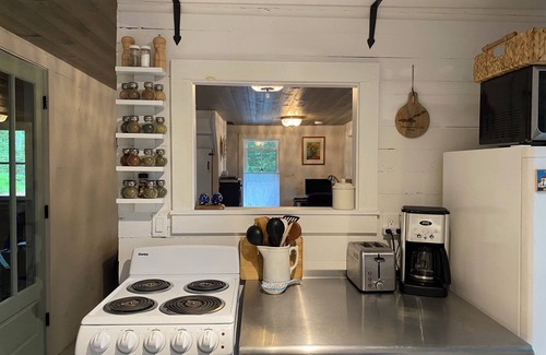 Readfield House | Charming, peaceful Maranacook waterfront camp nestled in the pines
