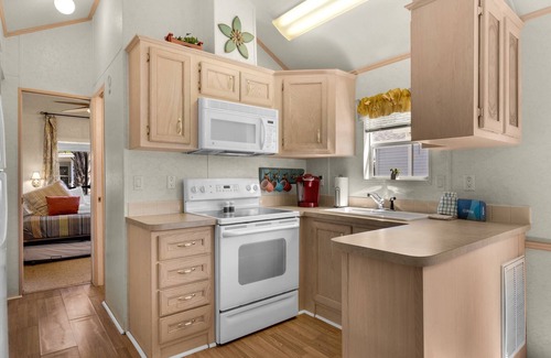 Upper Grand Lagoon Cottage | Charming pet-friendly cottage in a gated resort with amenities on the east end of Panama City Beach!