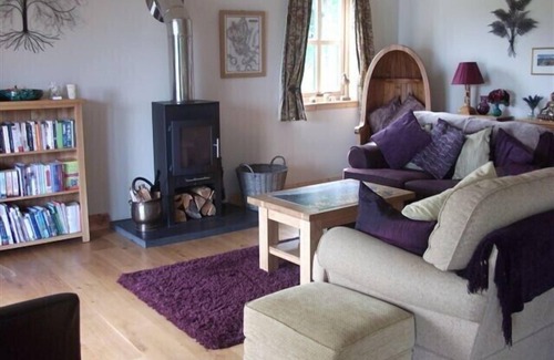 Teangue House | Charming property overlooking beach at Knock Bay and beyond to Knoydart