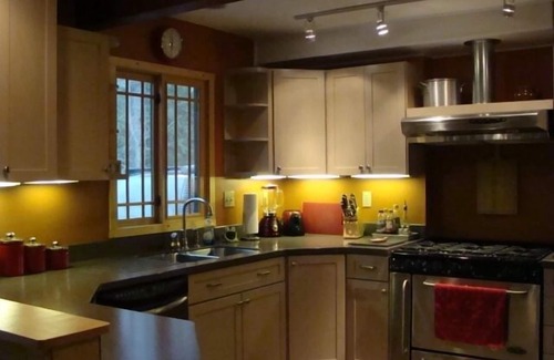 Cheboygan Cottage | Charming quality built home with private Mullett Lake beach access
