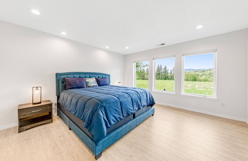 Tillamook House | Charming ranch-style retreat with lush acreage, firepit, fast WiFi, & gas grill