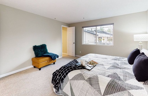 Bothell House | Charming retreat with a wood-burning fireplace, balcony, and a foosball table