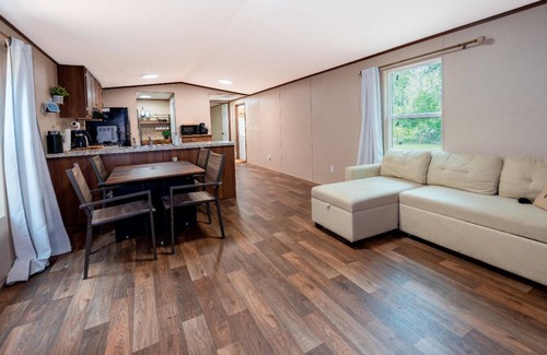 Clewiston House | Charming retreat with fire pit, games, and space for up to 5 guests. Book today.