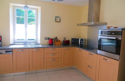 Asnieres-sur-Nouere Cottage | Charming Riverside Cottage with Terrace, Bikes, and Electric Car Charging