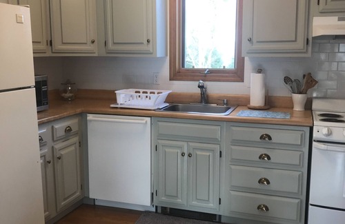West Falmouth Cottage | Charming saltbox cottage-minutes to bike path, dock and beach